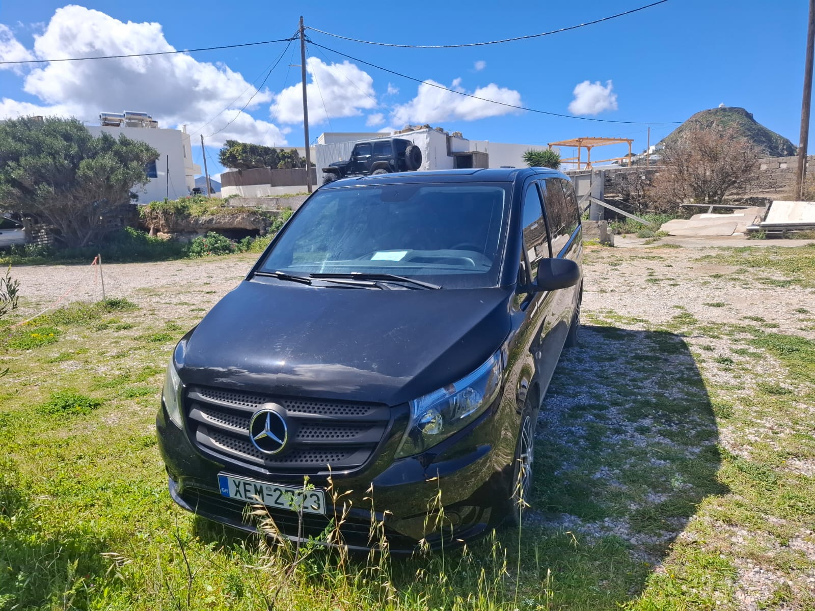 Mercedes-Benz Vito transfer vehicle parked on Milos